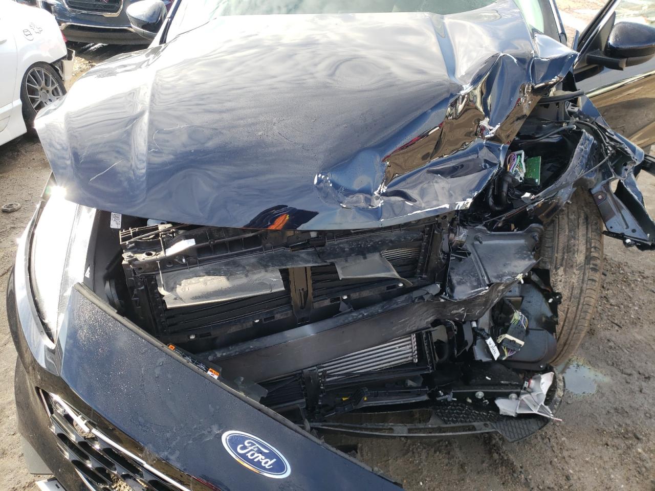 Photo 7 from auction – 2021 FORD ESCAPE SE with VIN 1FMCU9G63MUA47792