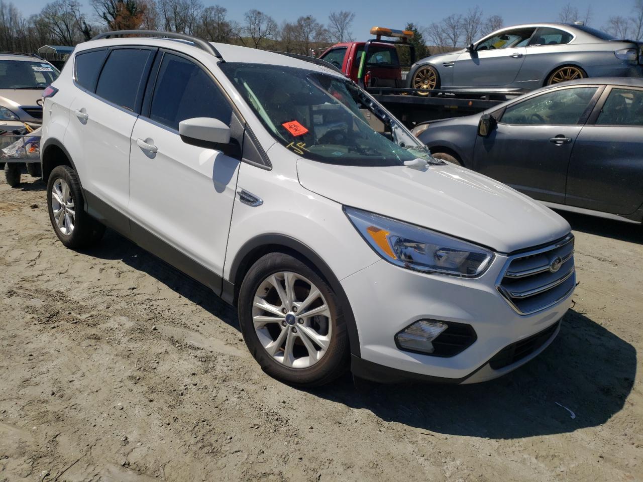 FORD ESCAPE SE 2018 with VIN 1FMCU0GD9JUC20625 - Photo from auction