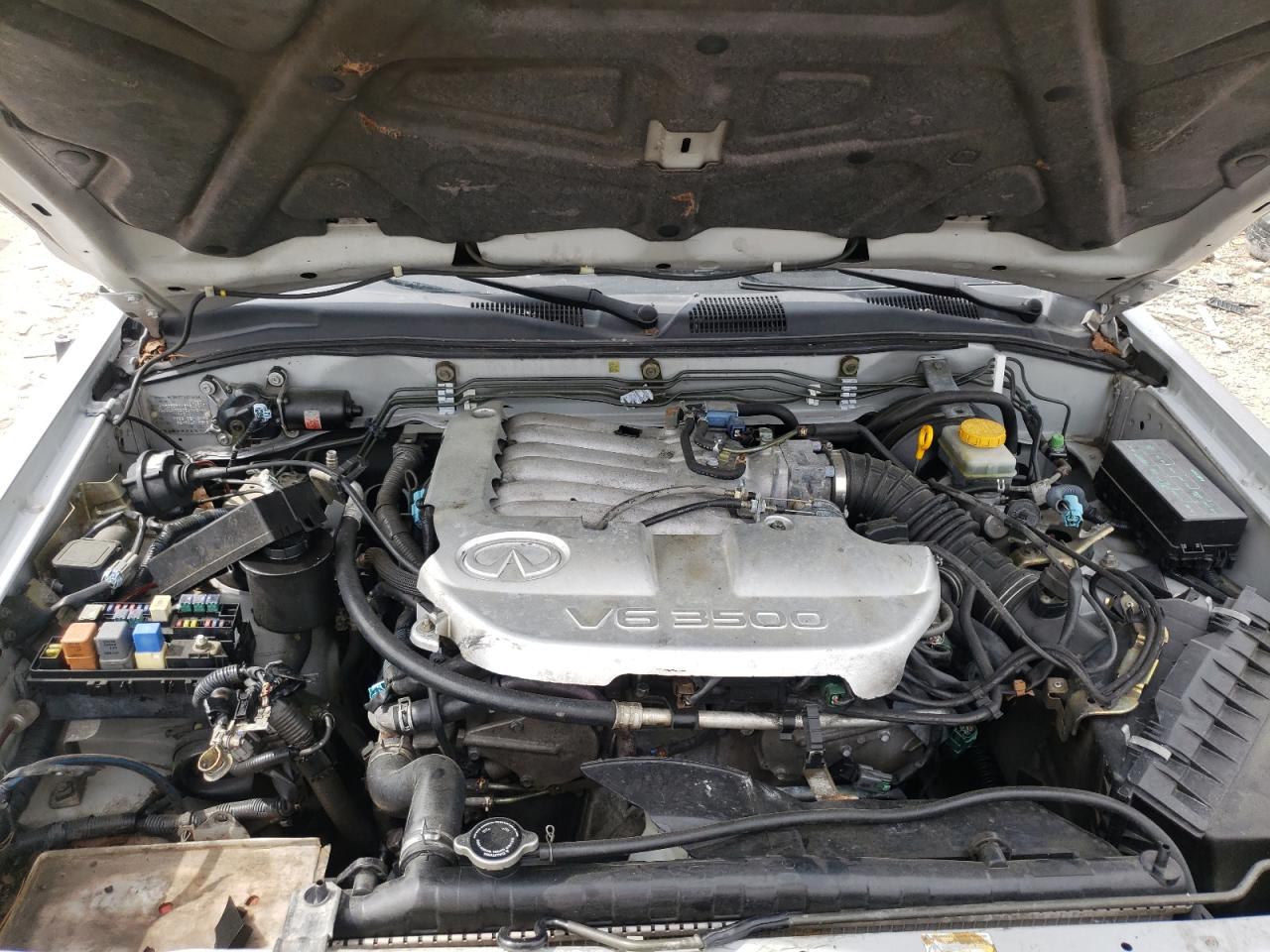 Photo 7 from auction – 2002 INFINITI QX4 with VIN JNRDR09X42W210849