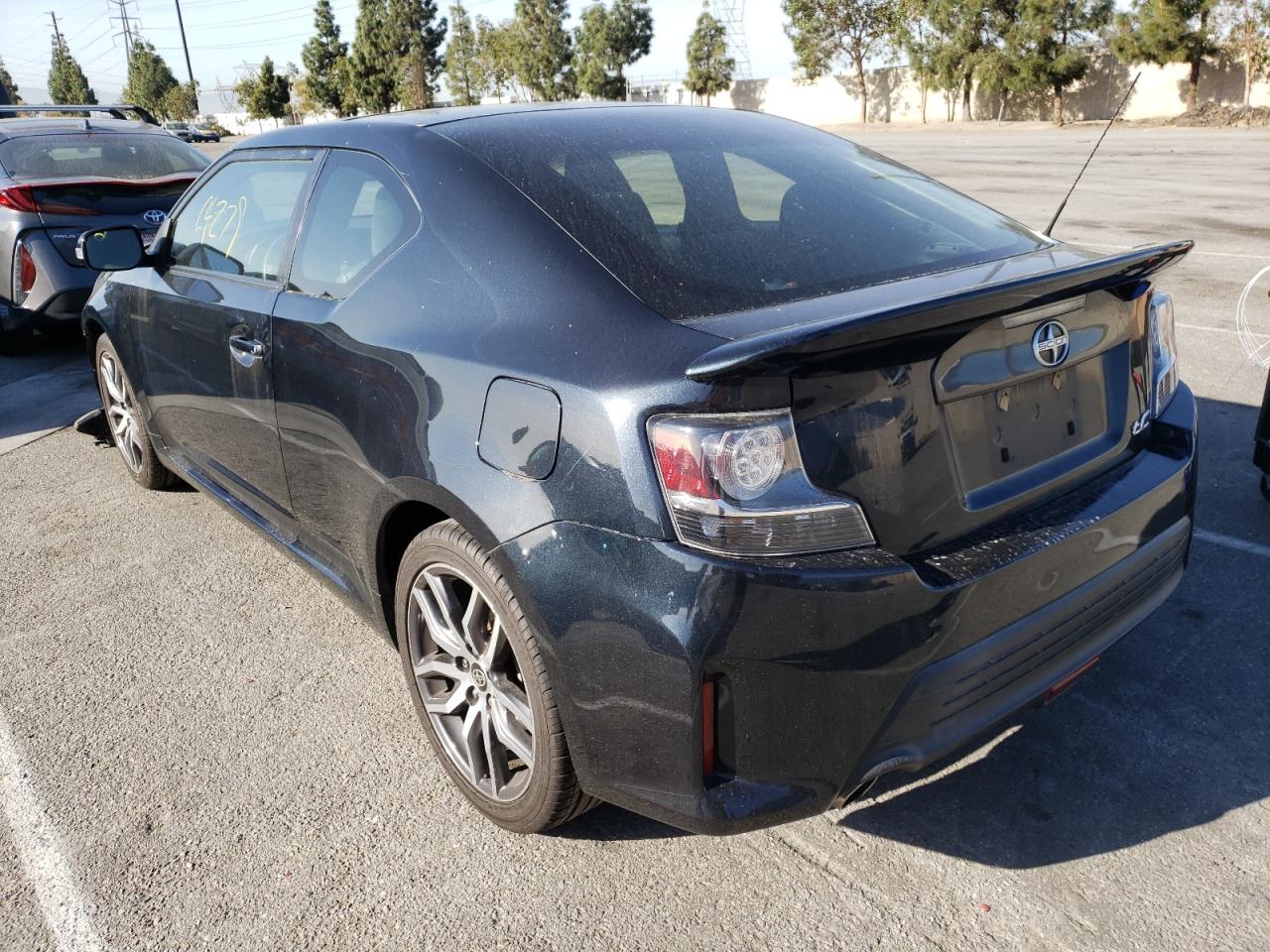 Photo 3 from auction – 2015 TOYOTA SCION TC with VIN JTKJF5C74FJ010034