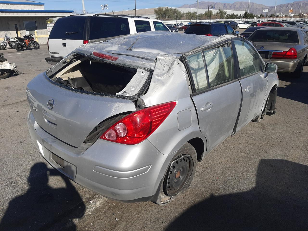Photo 4 from auction – 2011 NISSAN VERSA S with VIN 3N1BC1CPXBL477722