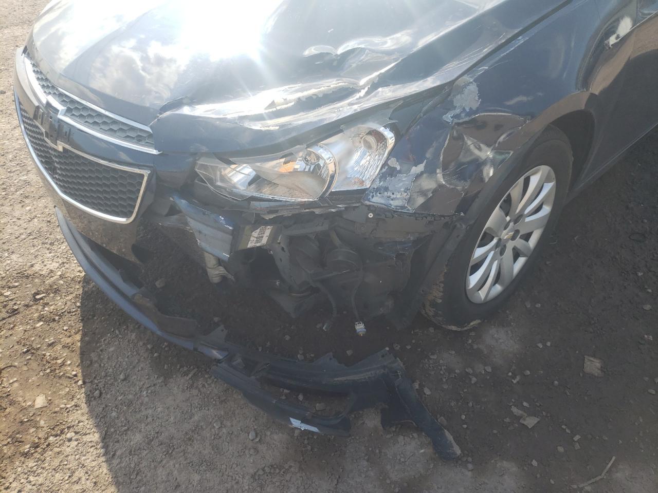 Photo 9 from auction – 2011 CHEVROLET CRUZE with VIN 1G1PC5SH1B7118728