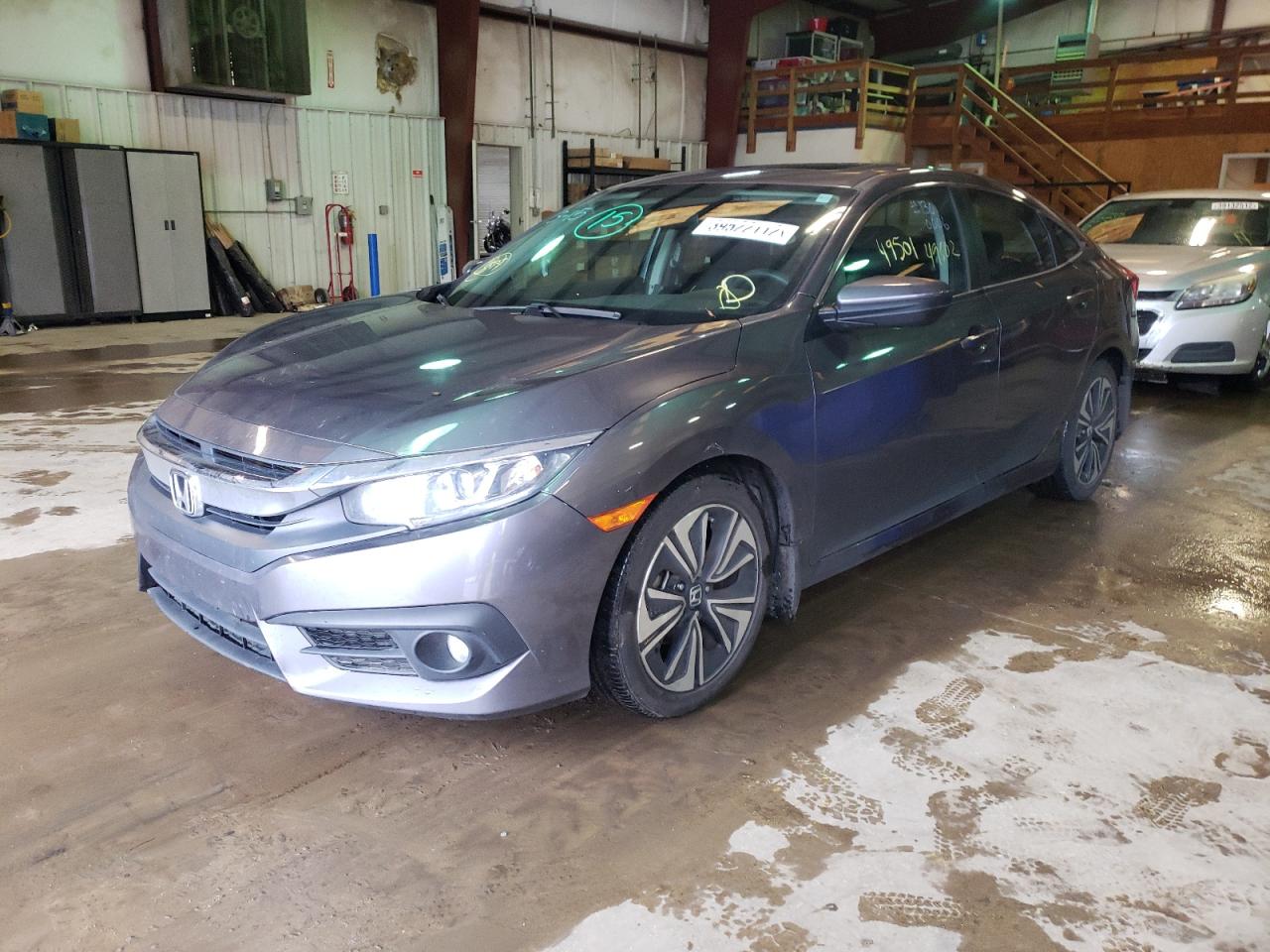 Photo 2 from auction – 2017 HONDA CIVIC EX with VIN 19XFC1F30HE010006