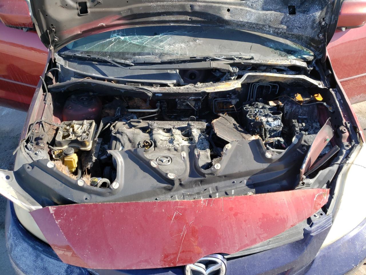 Photo 7 from auction – 2009 MAZDA 5 with VIN JM1CR293390333799
