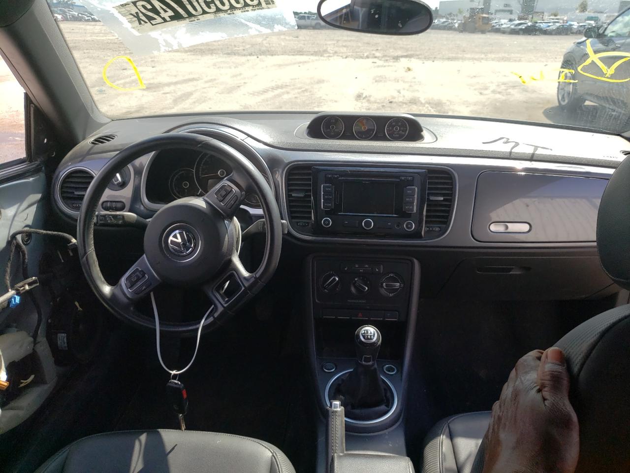 Photo 9 from auction – 2014 VOLKSWAGEN BEETLE with VIN 3VWRL7AT2EM645668
