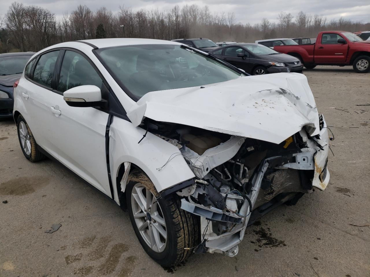 FORD FOCUS SE 2015 with VIN 1FADP3K23FL223160 - Photo from auction