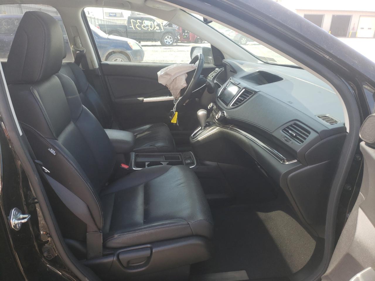 Photo 5 from auction – 2015 HONDA CR-V EXL with VIN 2HKRM4H72FH668690
