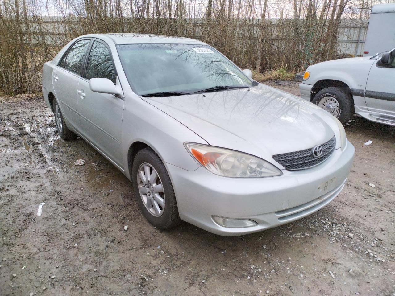 TOYOTA CAMRY LE 2003 with VIN JTDBF30K930148047 - Photo from auction