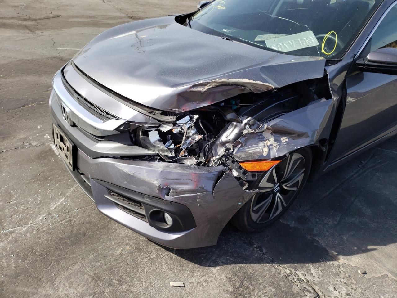 Photo 9 from auction – 2018 HONDA CIVIC with VIN JHMFC1F34JX037567