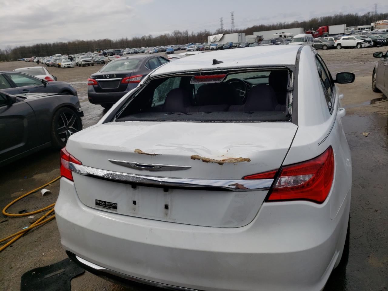 Photo 9 from auction – 2014 CHRYSLER 200 TOURIN with VIN 1C3CCBBB7EN194992