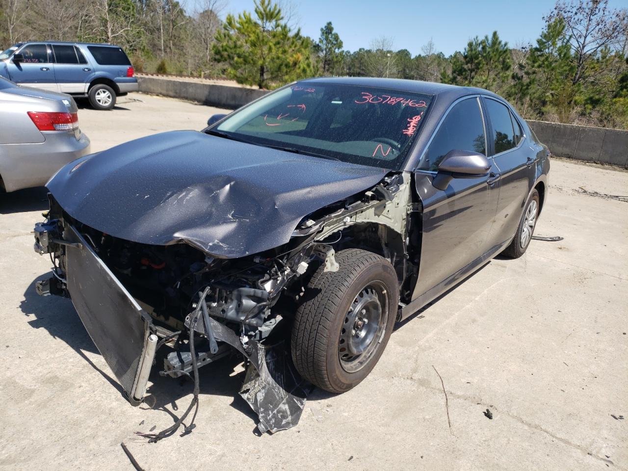 Photo 2 from auction – 2020 TOYOTA CAMRY LE with VIN 4T1C31AK7LU520778