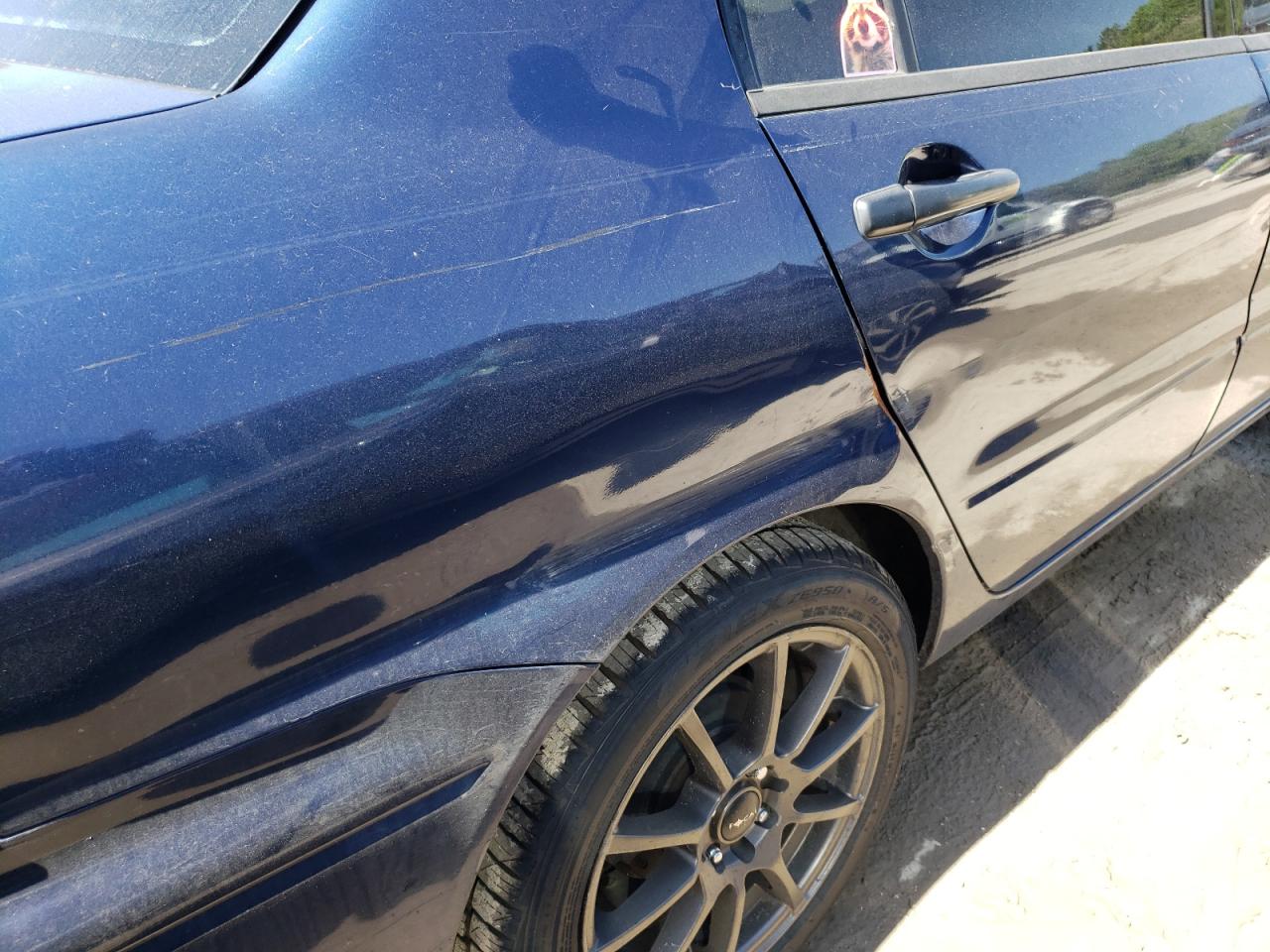 Photo 9 from auction – 2003 MITSUBISHI LANCER ES with VIN JA3AJ26E03U120473