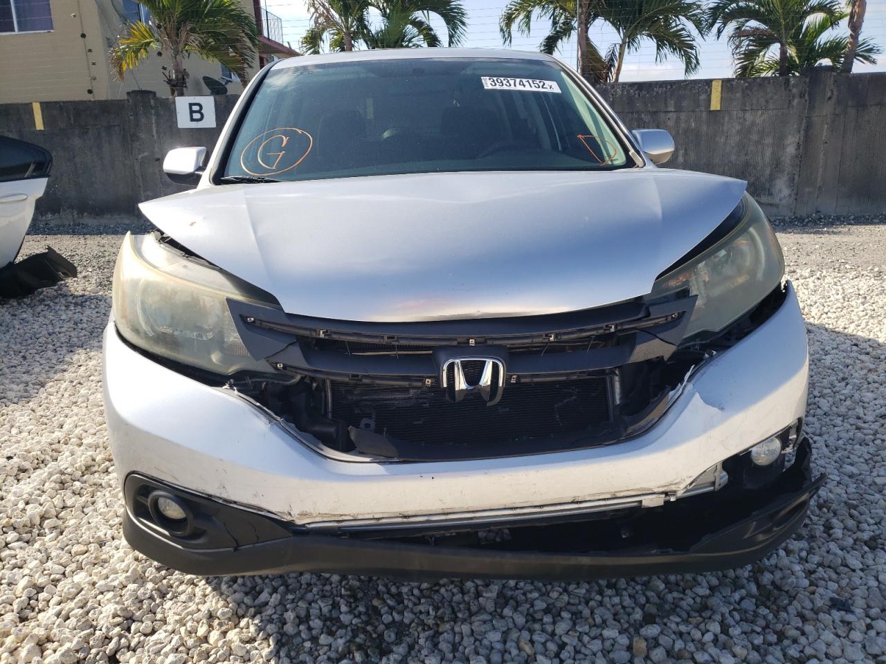 Photo 9 from auction – 2014 HONDA CR-V EX with VIN 2HKRM3H50EH563556