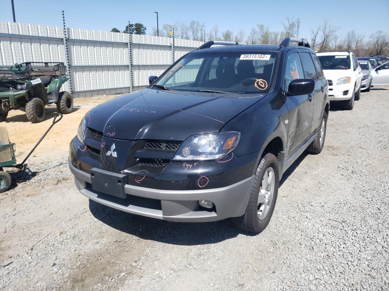 Photo 2 from auction – 2003 MITSUBISHI OUTLANDER with VIN JA4LX41G33U109944