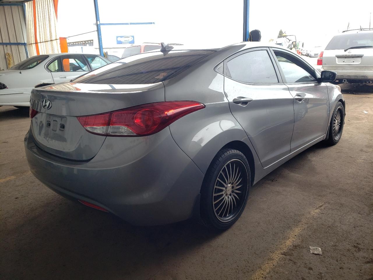 Photo 4 from auction – 2011 HYUNDAI ELANTRA GL with VIN KMHDH4AE8BU173235