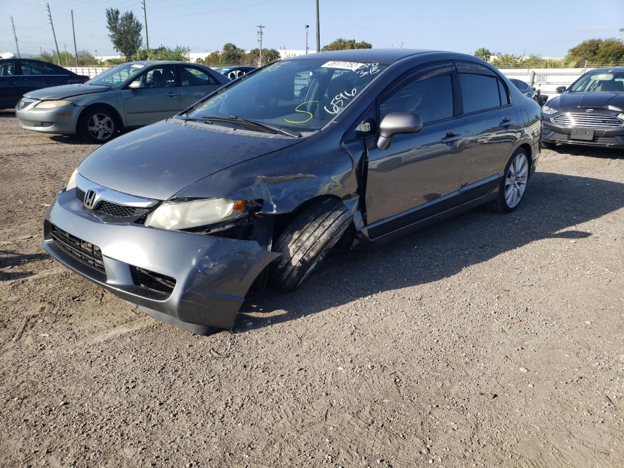 Photo 2 from auction – 2011 HONDA CIVIC LX with VIN 19XFA1F53BE036596