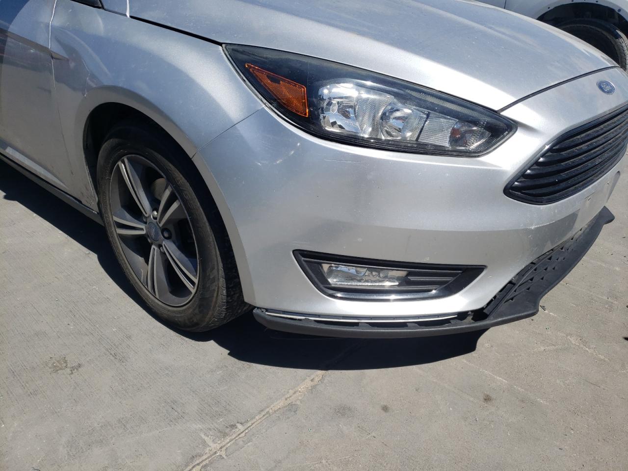 Photo 9 from auction – 2016 FORD FOCUS SE with VIN 1FADP3FE8GL359855
