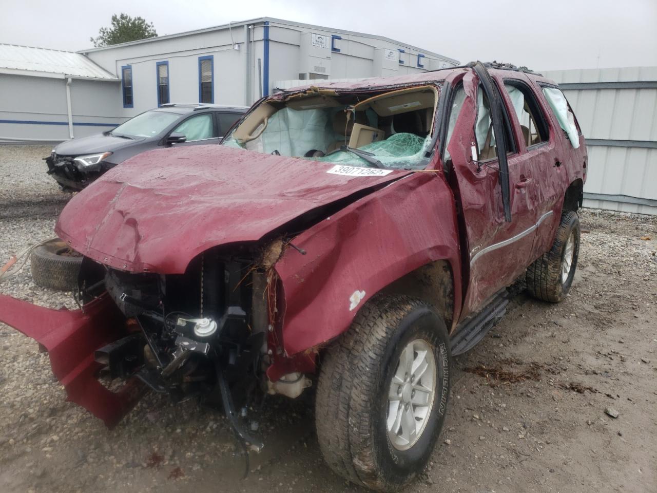 Photo 2 from auction – 2011 GMC YUKON SLE with VIN 1GKS2AE02BR144928