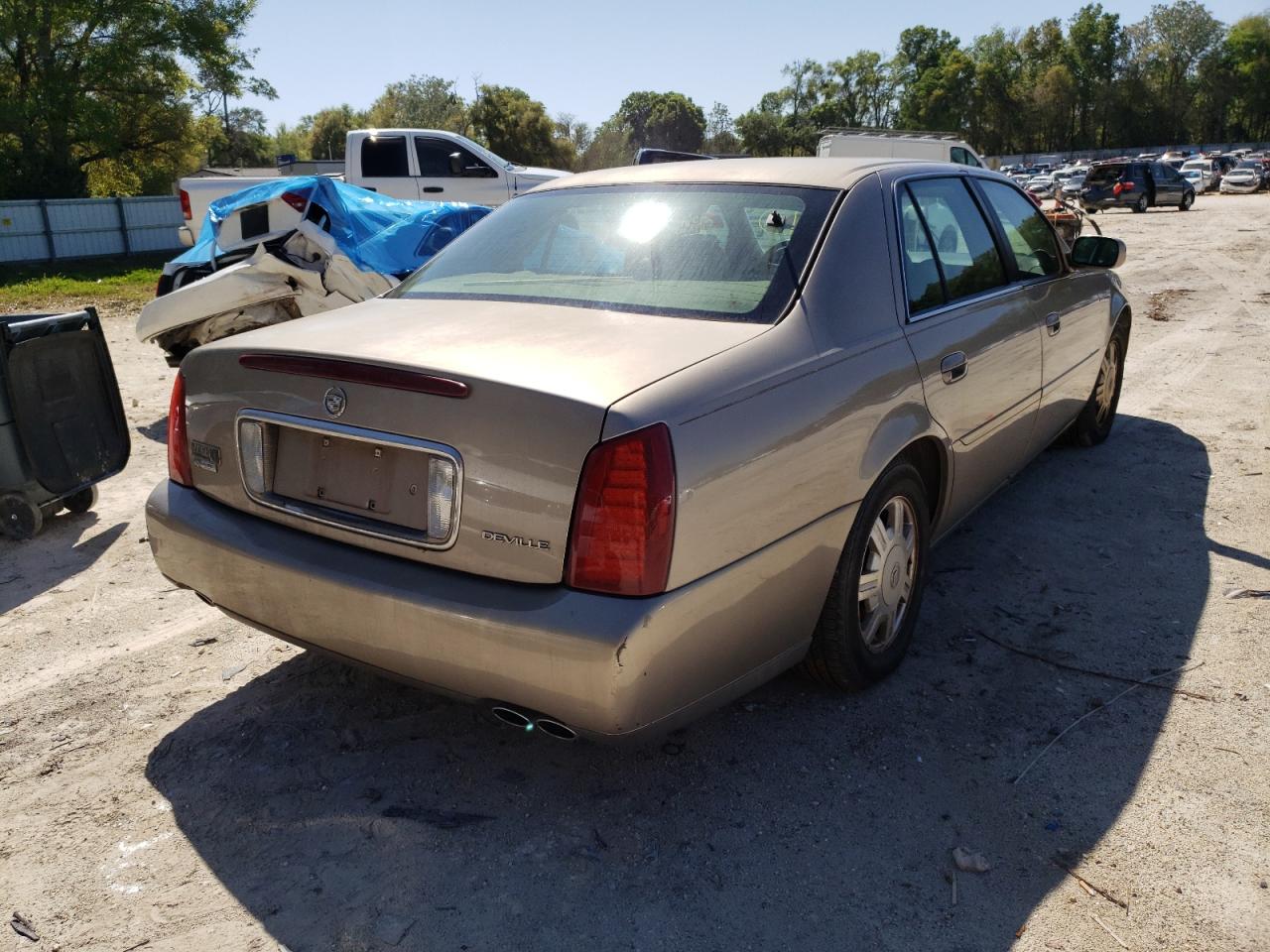 Photo 4 from auction – 2004 CADILLAC DEVILLE with VIN 1G6KD54YX4U104216