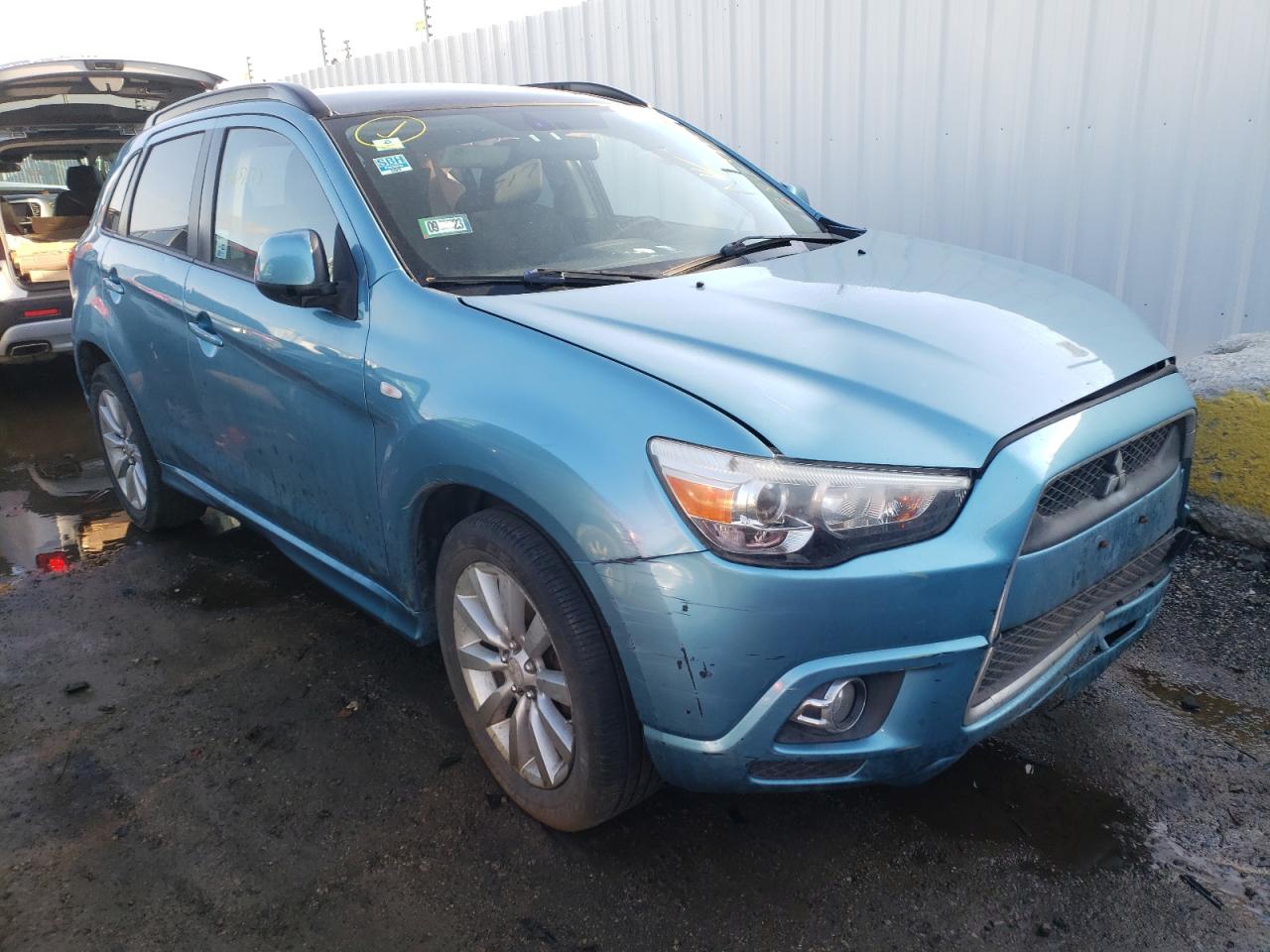 MITSUBISHI OUTLANDER 2011 with VIN JA4AR4AU5BZ004086 - Photo from auction