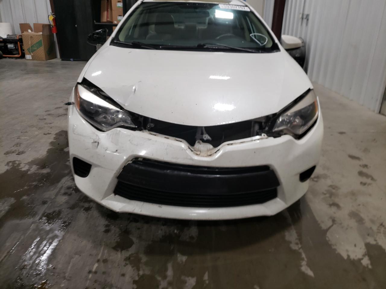 Photo 9 from auction – 2014 TOYOTA COROLLA EC with VIN 5YFBPRHE6EP038743
