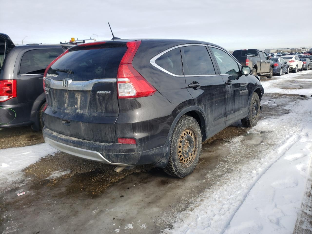 Photo 4 from auction – 2015 HONDA CR-V EXL with VIN 2HKRM4H77FH103853