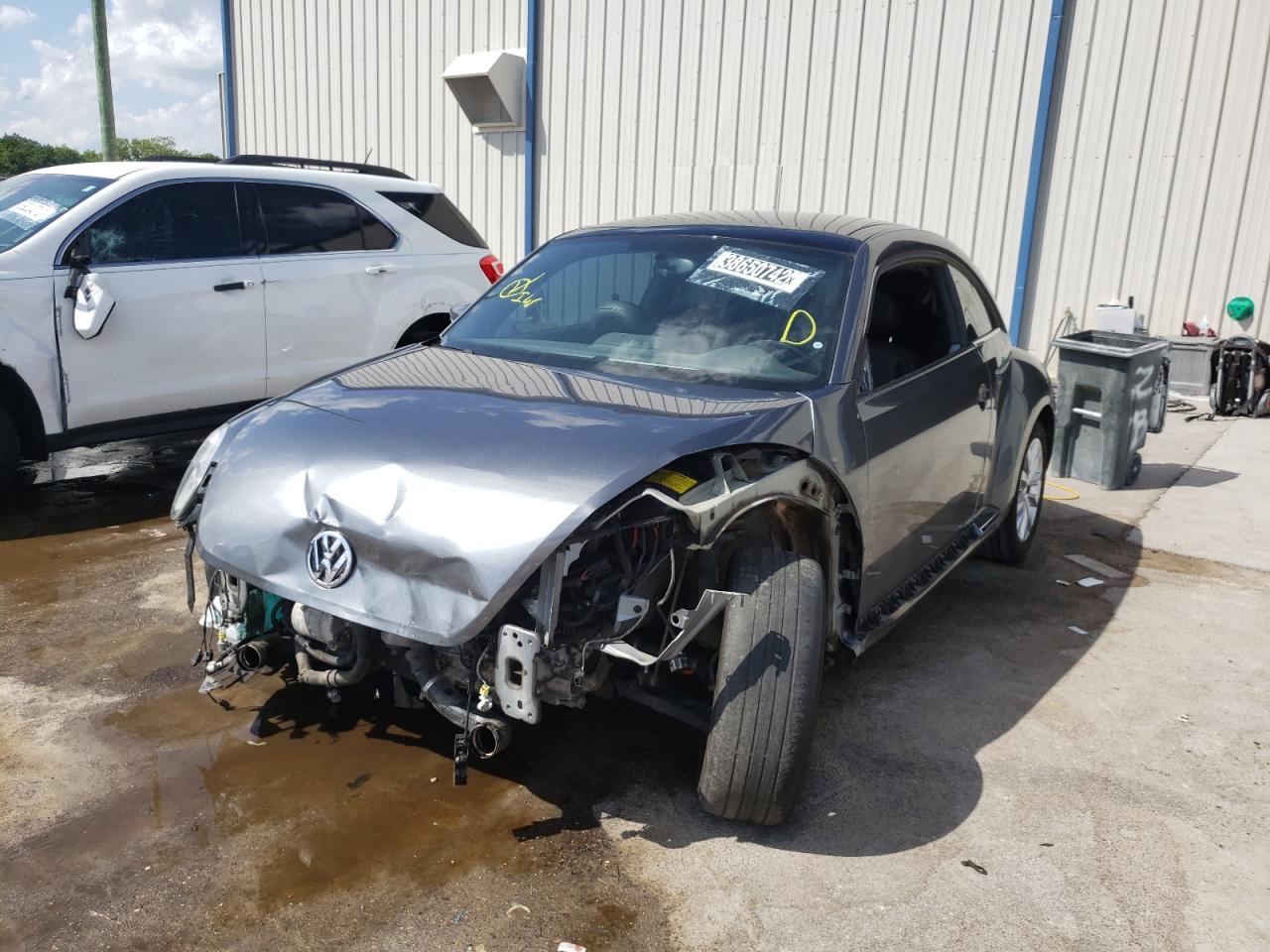 Photo 2 from auction – 2014 VOLKSWAGEN BEETLE with VIN 3VWRL7AT2EM645668