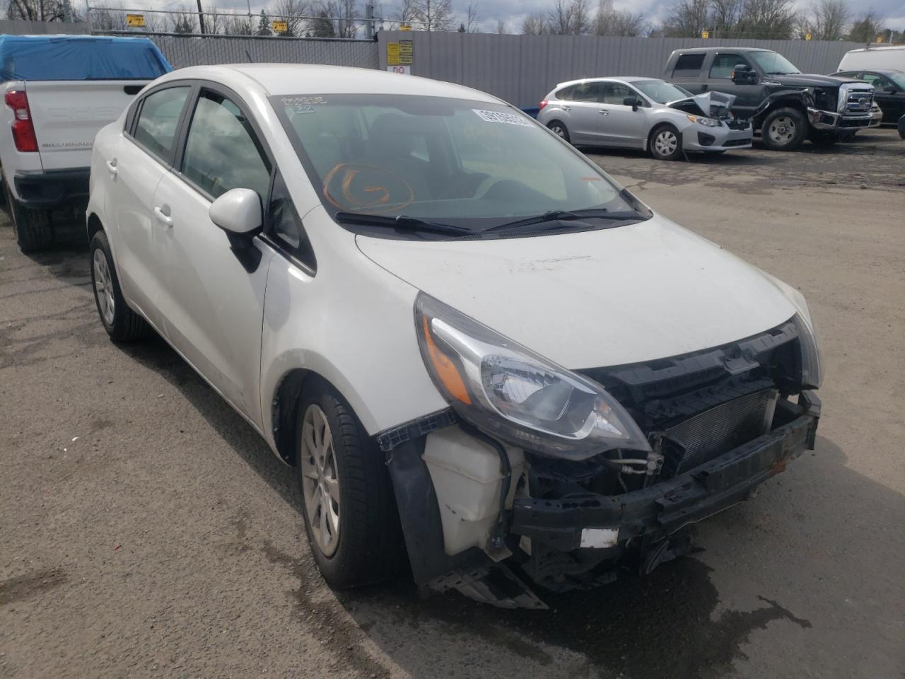 KIA RIO LX 2013 with VIN KNADM4A33D6164798 - Photo from auction