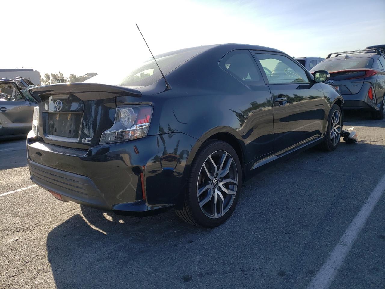 Photo 4 from auction – 2015 TOYOTA SCION TC with VIN JTKJF5C74FJ010034