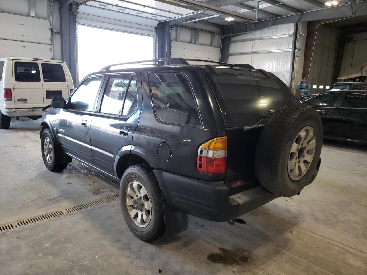 Photo 3 from auction – 1998 HONDA PASSPORT E with VIN 4S6CM58W2W4416496