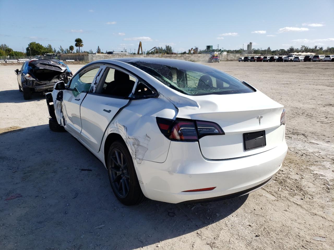 Photo 3 from auction – 2021 TESLA MODEL 3 with VIN 5YJ3E1EA4MF087141