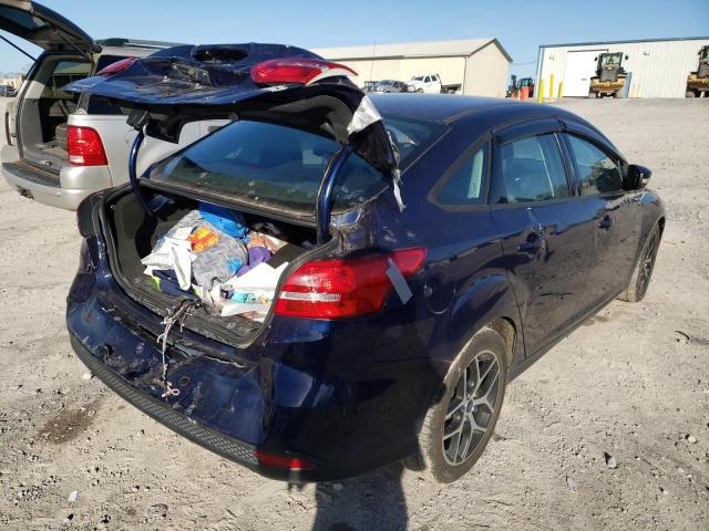 Photo 4 from auction – 2016 FORD FOCUS SE with VIN 1FADP3F24GL307628