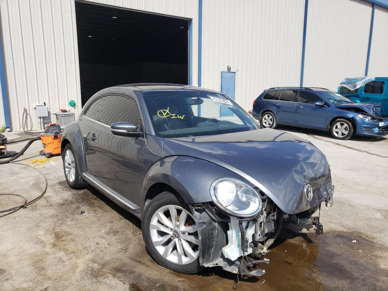Photo 1 from auction – 2014 VOLKSWAGEN BEETLE with VIN 3VWRL7AT2EM645668
