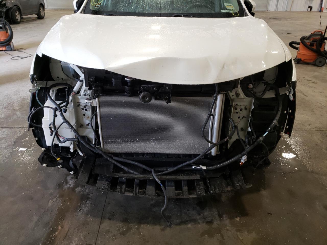 Photo 9 from auction – 2015 NISSAN ROGUE S with VIN 5N1AT2MVXFC814074