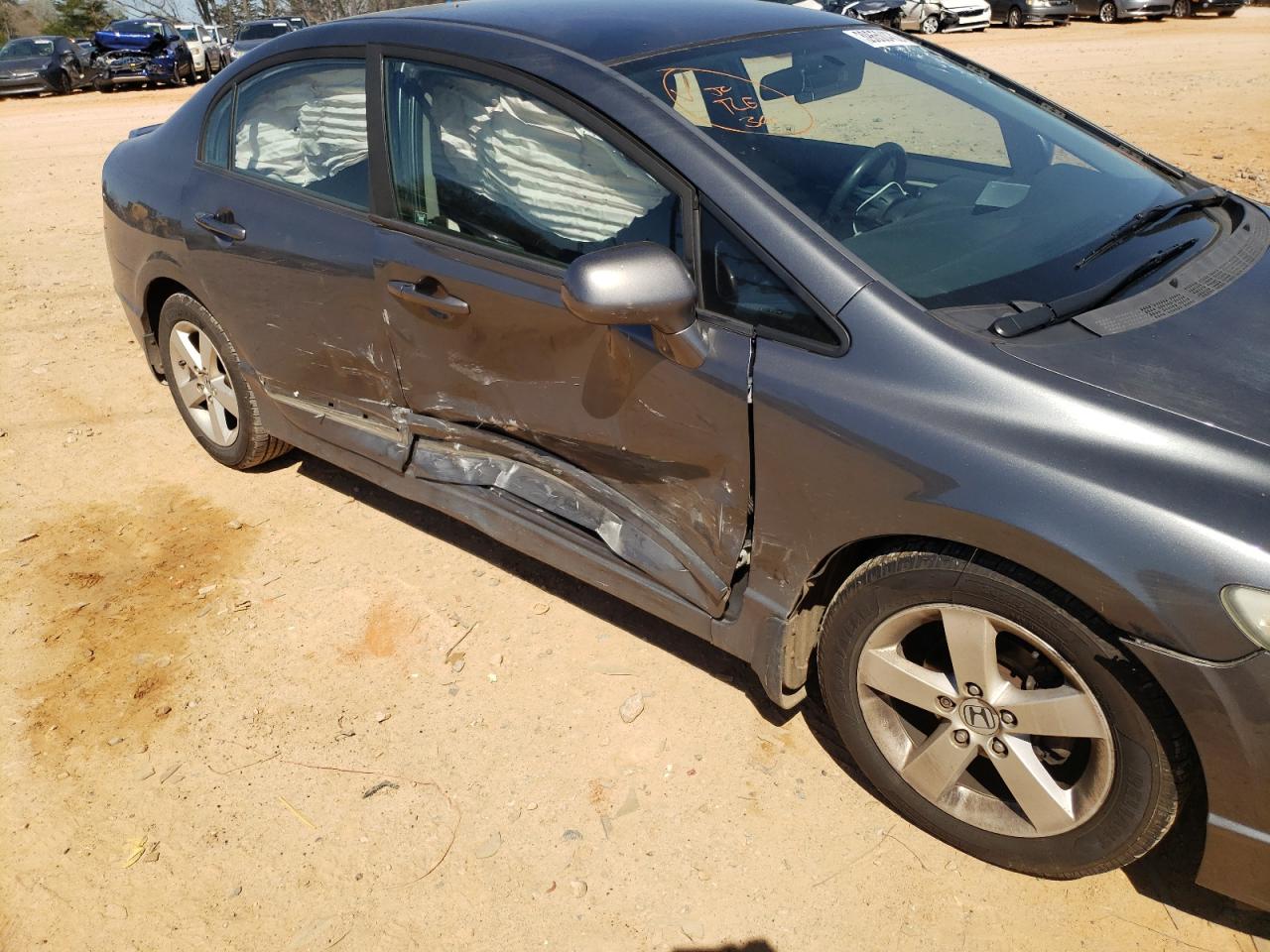 Photo 9 from auction – 2011 HONDA CIVIC LX-S with VIN 19XFA1F66BE002029