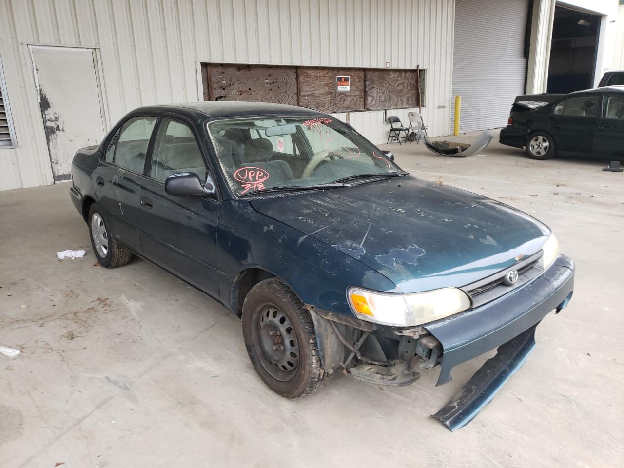 TOYOTA COROLLA LE 1994 with VIN 2T1AE09B2RC068099 - Photo from auction