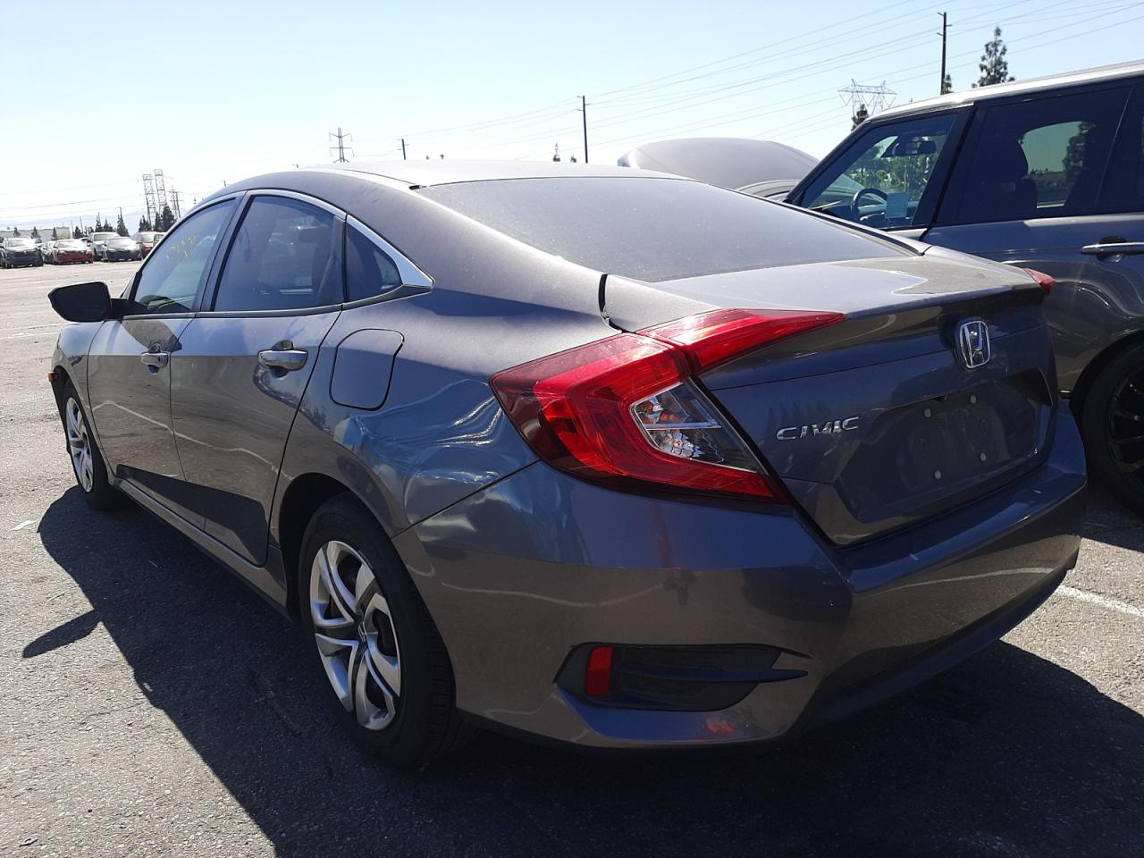 Photo 3 from auction – 2017 HONDA CIVIC LX with VIN 19XFC2F57HE221789