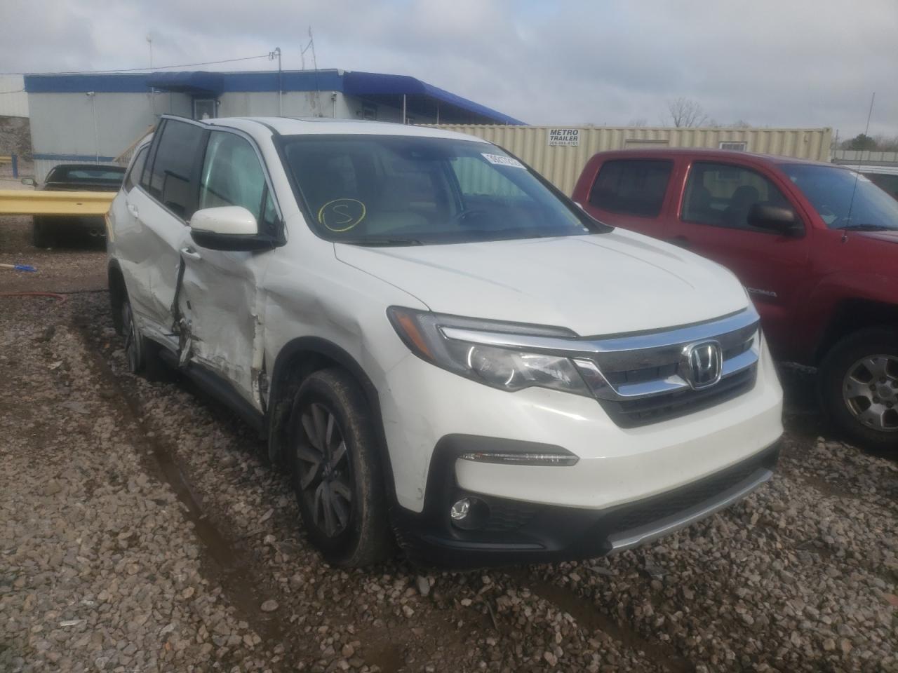 HONDA PILOT EXL 2021 with VIN 5FNYF5H59MB017045 - Photo from auction