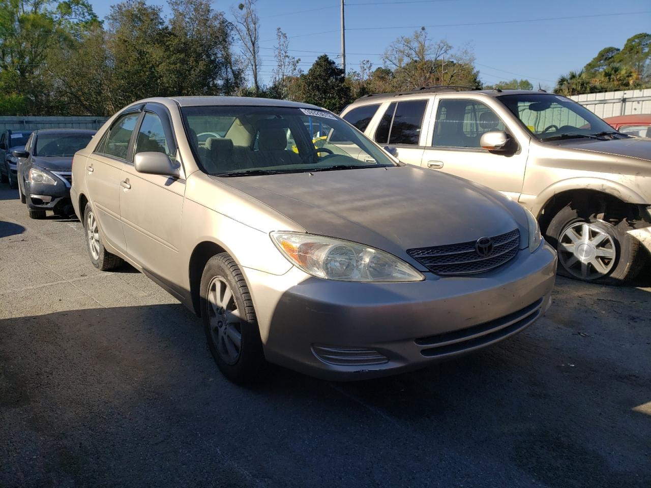 TOYOTA CAMRY LE 2002 with VIN 4T1BE32K02U531541 - Photo from auction