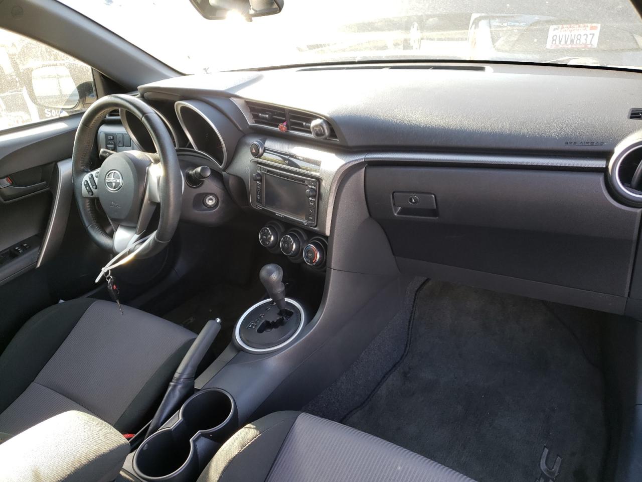 Photo 9 from auction – 2015 TOYOTA SCION TC with VIN JTKJF5C74FJ010034