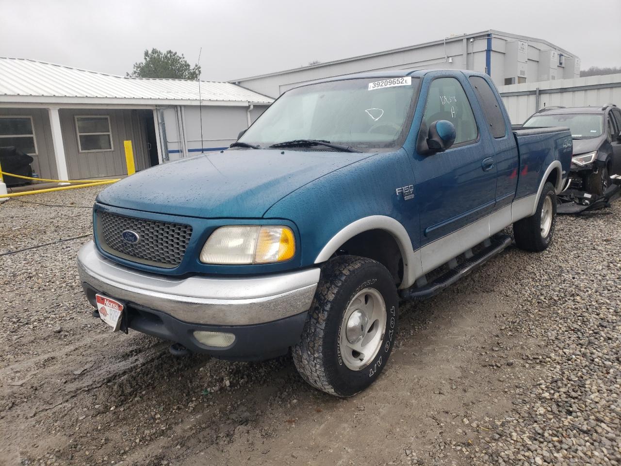 Photo 2 from auction – 2000 FORD F150 with VIN 1FTRX18L8YKA00450
