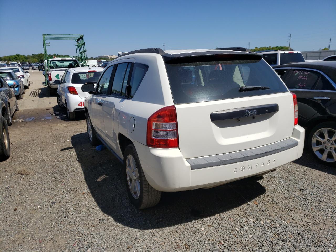 Photo 3 from auction – 2010 JEEP COMPASS SP with VIN 1J4NT4FB8AD553979