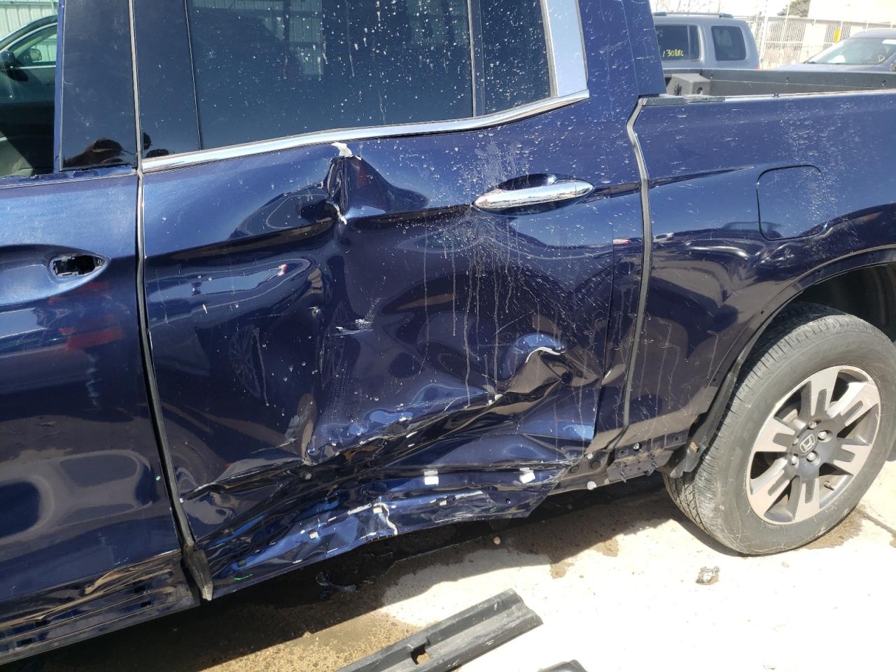 Photo 9 from auction – 2019 HONDA RIDGELINE with VIN 5FPYK3F7XKB006564