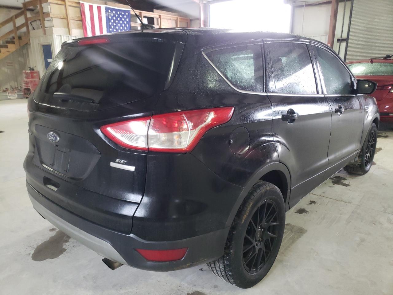 Photo 4 from auction – 2016 FORD ESCAPE SE with VIN 1FMCU0GX7GUB96408