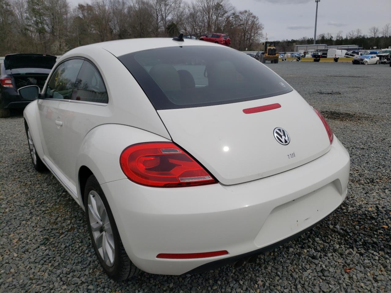 Photo 3 from auction – 2014 VOLKSWAGEN BEETLE with VIN 3VWJL7AT2EM611260