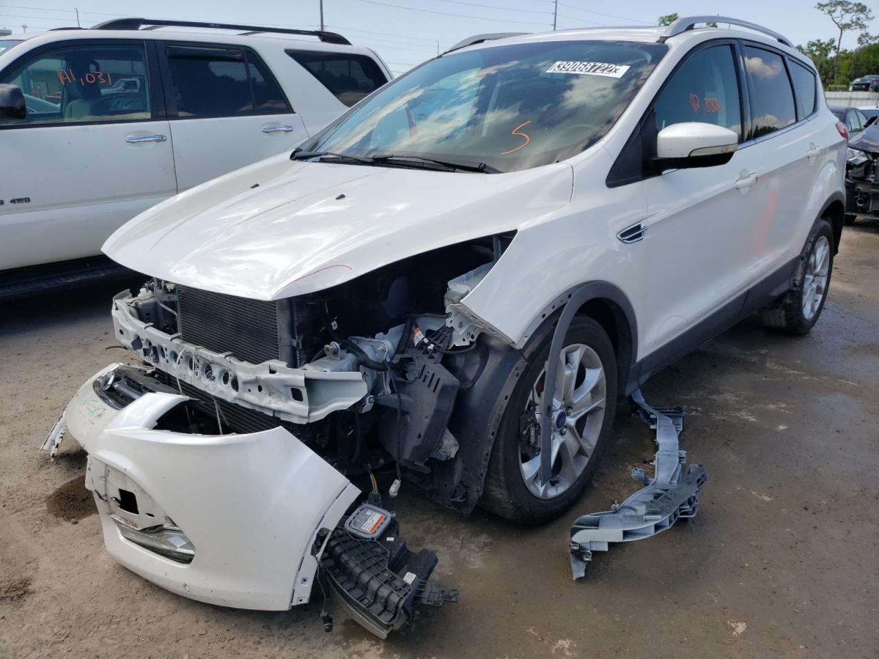 Photo 2 from auction – 2016 FORD ESCAPE TIT with VIN 1FMCU0JX7GUA11721