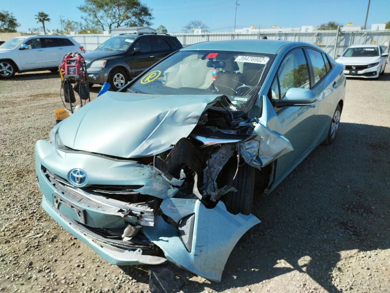 Photo 2 from auction – 2016 TOYOTA PRIUS with VIN JTDKARFU7G3024213