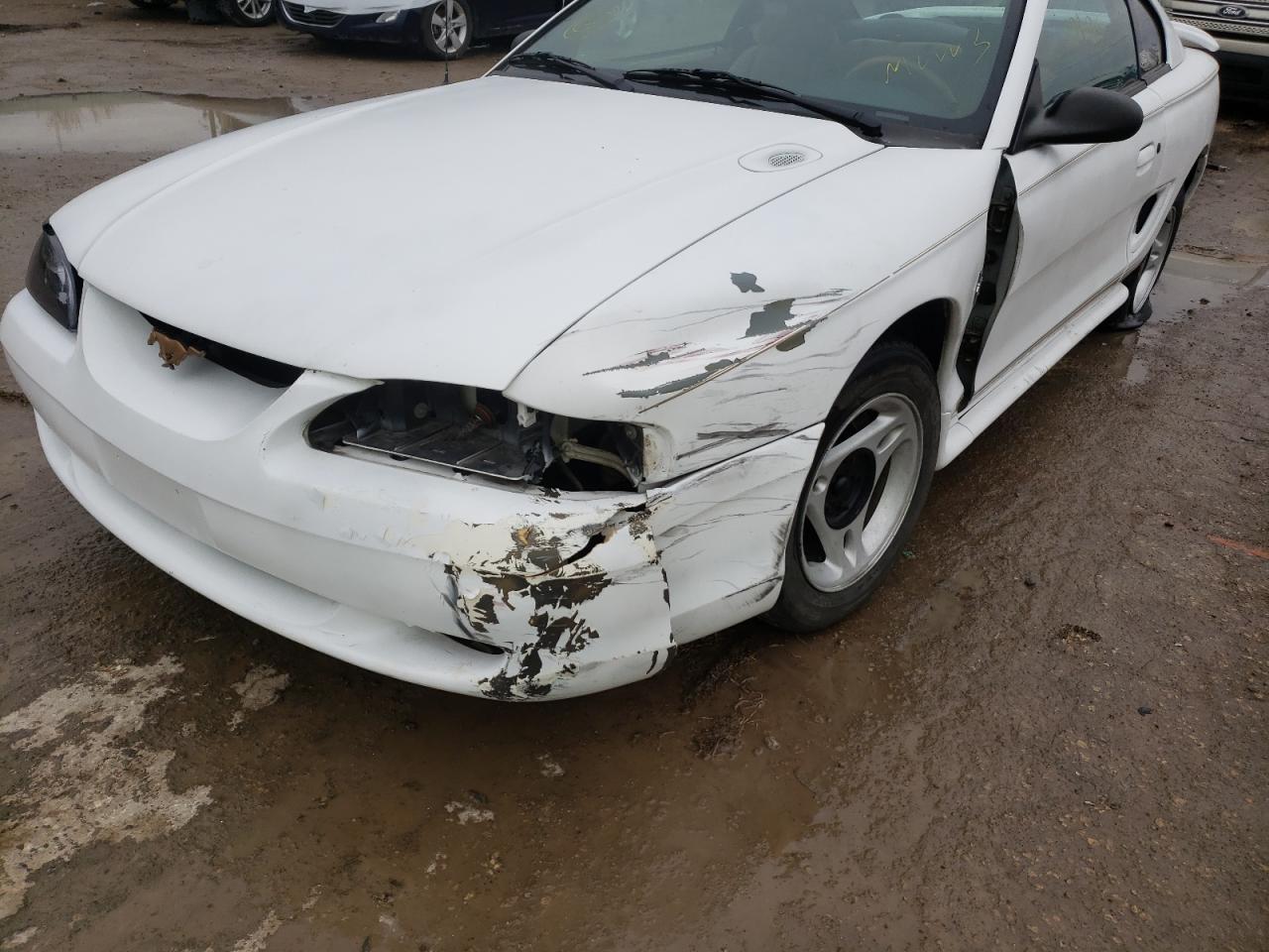 Photo 9 from auction – 1997 FORD MUSTANG with VIN 1FALP4047VF100142