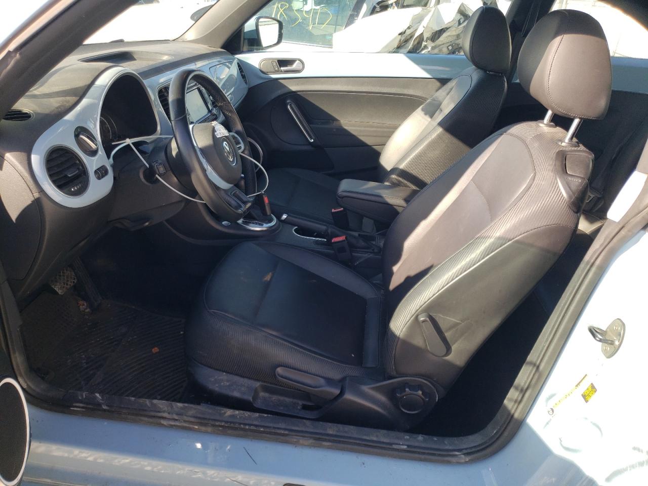 Photo 5 from auction – 2014 VOLKSWAGEN BEETLE with VIN 3VWJ17AT5EM659258
