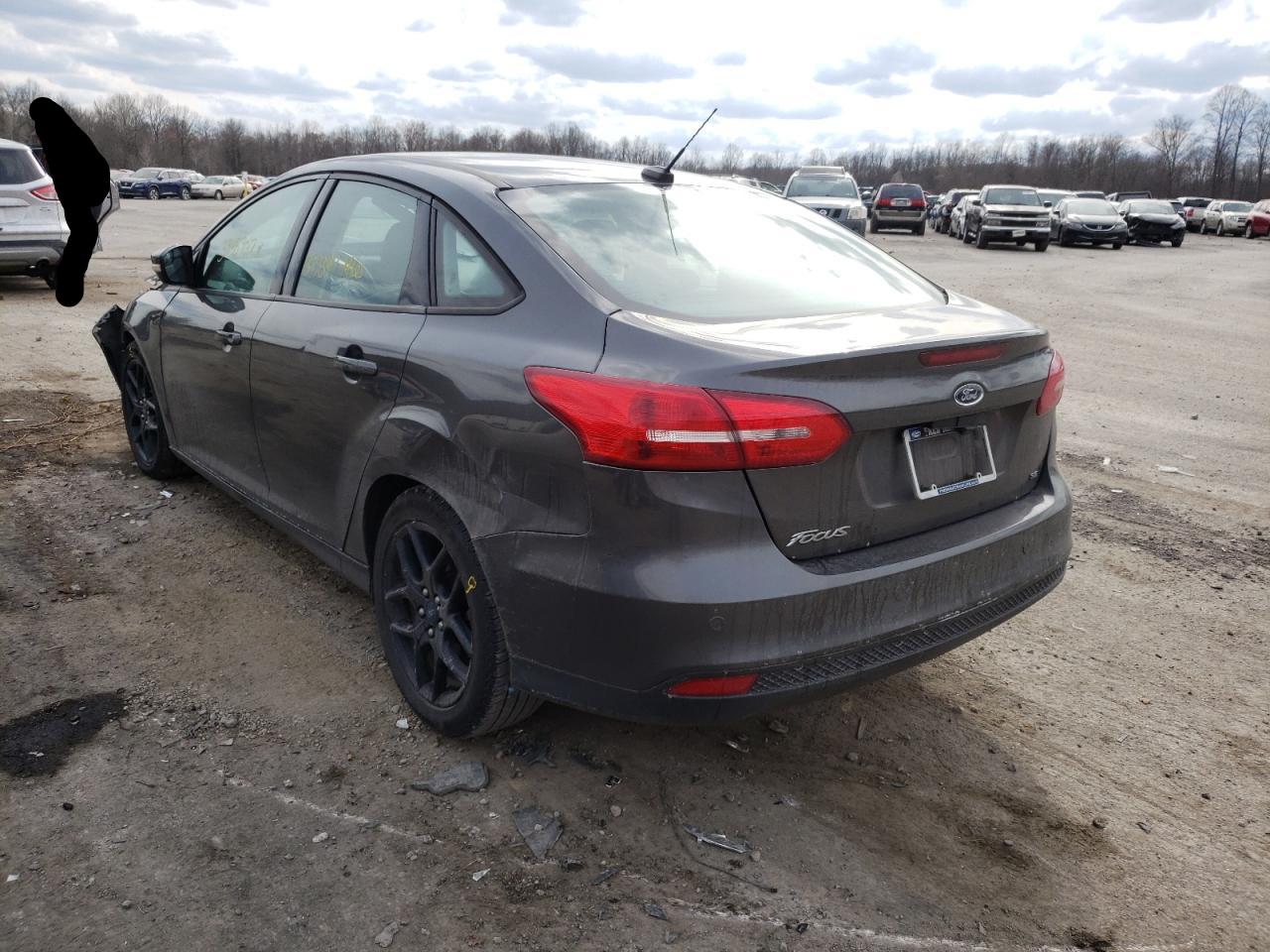 Photo 3 from auction – 2016 FORD FOCUS SE with VIN 1FADP3F21GL298712